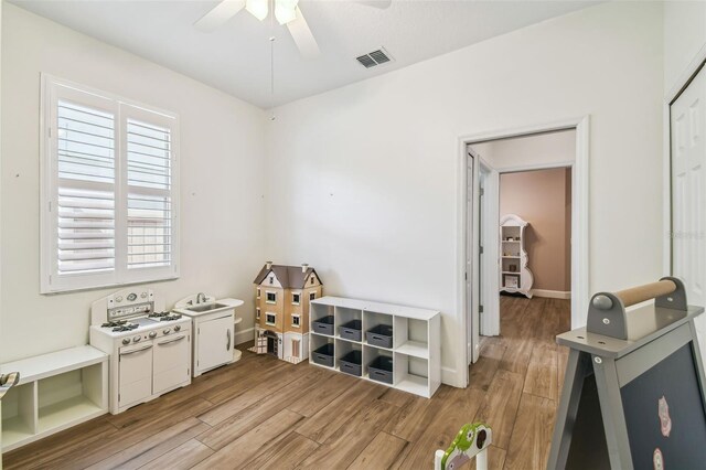 14003 Sobrado Dr, Orlando, FL 32837 - rec room featuring a ceiling fan and light wood-style floors