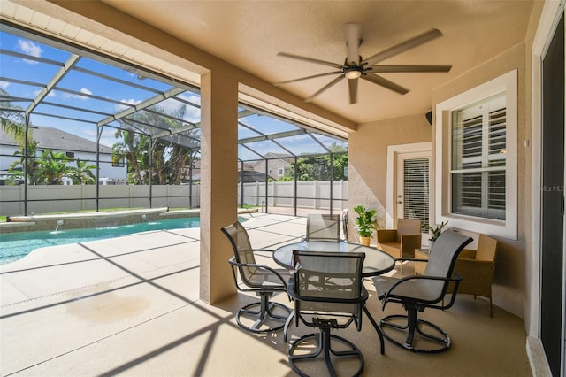 14003 Sobrado Dr, Orlando, FL 32837 - view of patio / terrace with fence, a ceiling fan, and glass enclosure