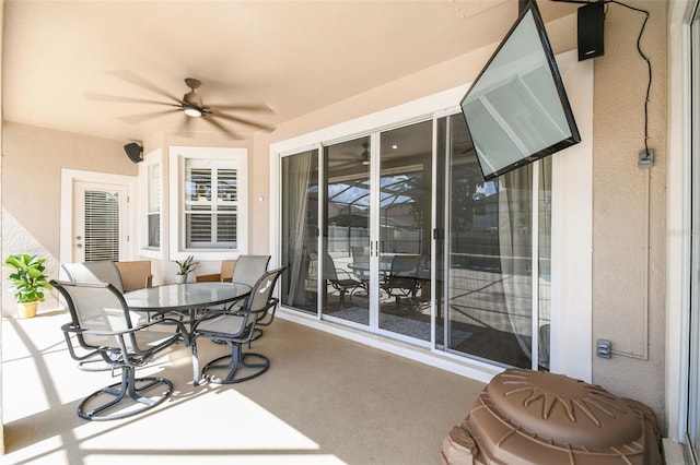 14003 Sobrado Dr, Orlando, FL 32837 - sunroom / solarium featuring a ceiling fan and outdoor dining space