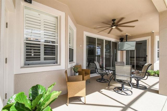 14003 Sobrado Dr, Orlando, FL 32837 - view of patio featuring a ceiling fan and outdoor dining area
