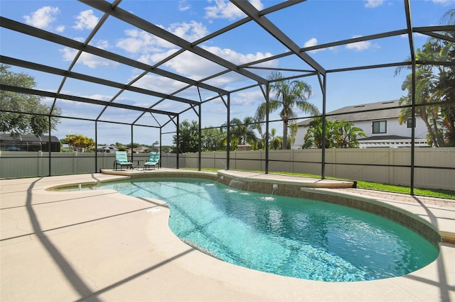 14003 Sobrado Dr, Orlando, FL 32837 - view of swimming pool with a patio area, a fenced backyard, and glass enclosure