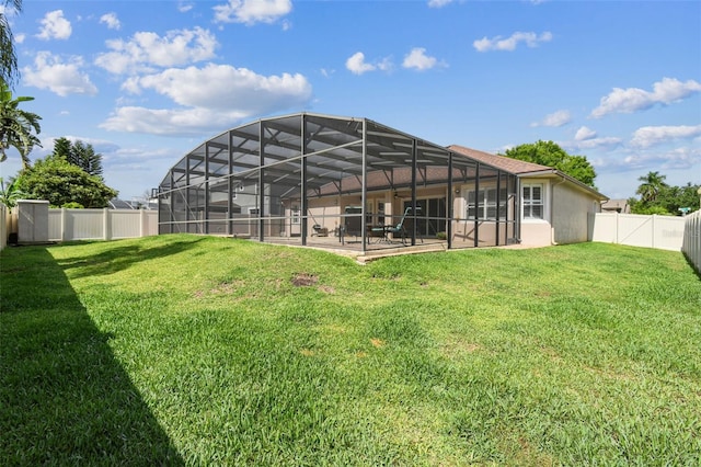 14003 Sobrado Dr, Orlando, FL 32837 - rear view of property featuring a patio area and glass enclosure