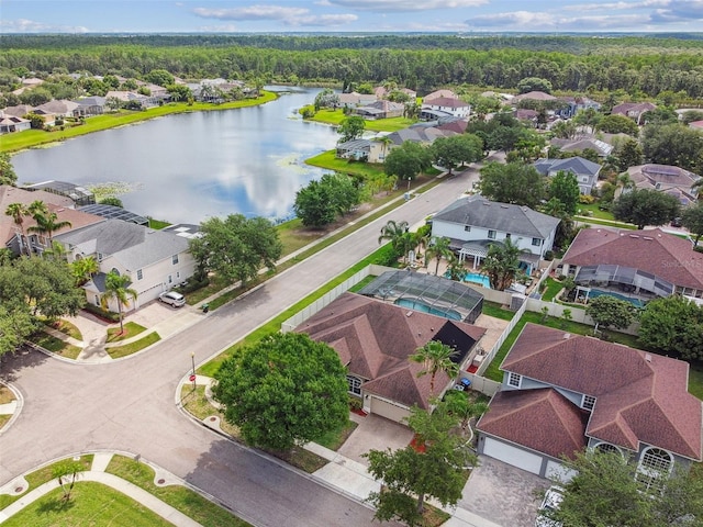 14003 Sobrado Dr, Orlando, FL 32837 - aerial view of residential area featuring a large body of water and a heavily wooded area