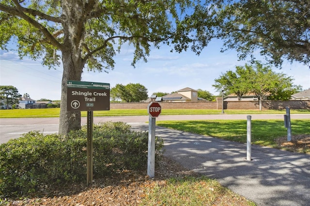14003 Sobrado Dr, Orlando, FL 32837 - view of road featuring traffic signs