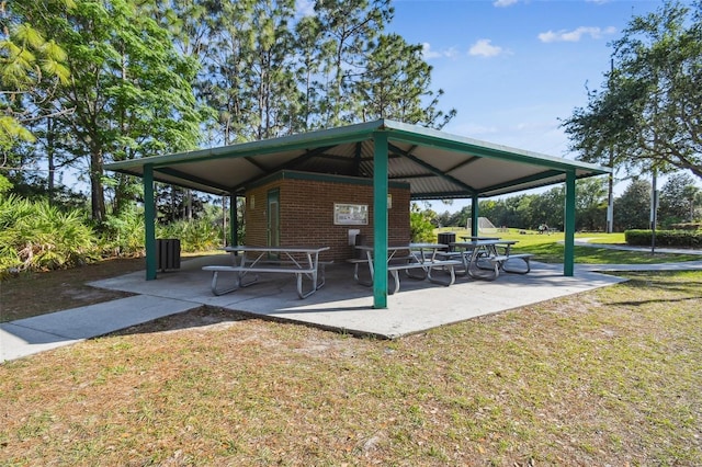 14003 Sobrado Dr, Orlando, FL 32837 - view of community featuring a gazebo, a yard, and a patio area