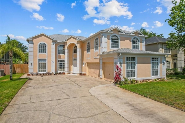 1240 Falconcrest Blvd, Apopka, FL 32712 - view of front of property featuring an attached garage, concrete driveway, and stucco siding