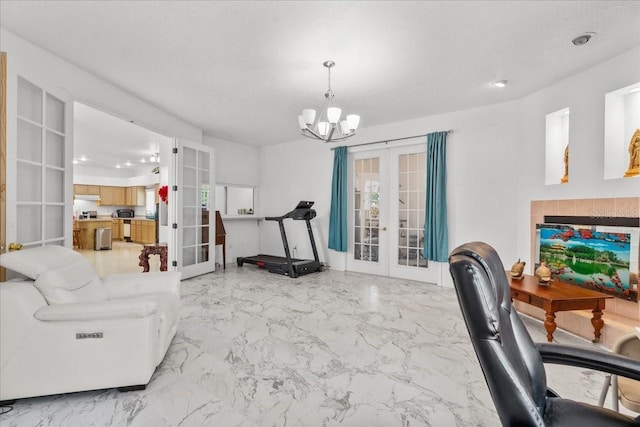 1240 Falconcrest Blvd, Apopka, FL 32712 - living area featuring french doors, a chandelier, and light marble finish floors