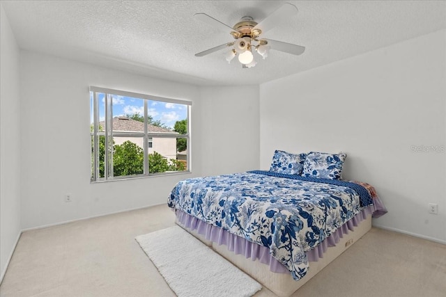 1240 Falconcrest Blvd, Apopka, FL 32712 - bedroom with carpet, a textured ceiling, and a ceiling fan