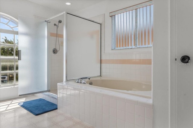 1240 Falconcrest Blvd, Apopka, FL 32712 - full bath featuring healthy amount of natural light, a garden tub, and tiled shower