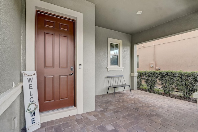 17084 Harbor Oak Pkwy, Winter Garden, FL 34787 - property entrance featuring stucco siding and a porch