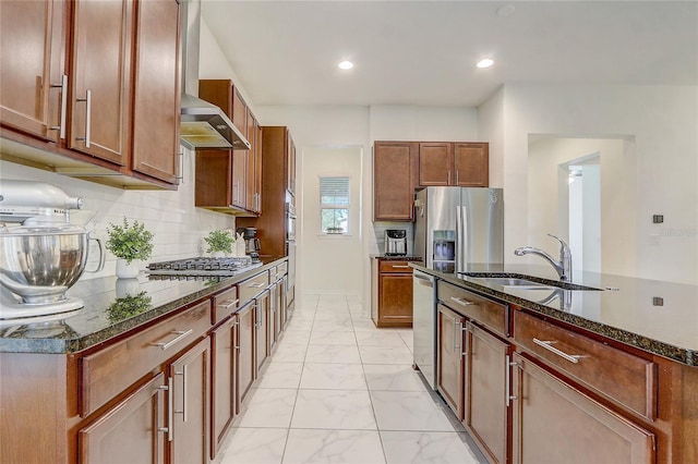 17084 Harbor Oak Pkwy, Winter Garden, FL 34787 - kitchen with a sink, appliances with stainless steel finishes, light marble finish floors, dark stone countertops, and recessed lighting