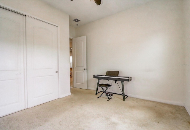 17084 Harbor Oak Pkwy, Winter Garden, FL 34787 - bedroom with carpet floors, a closet, baseboards, a ceiling fan, and a desk