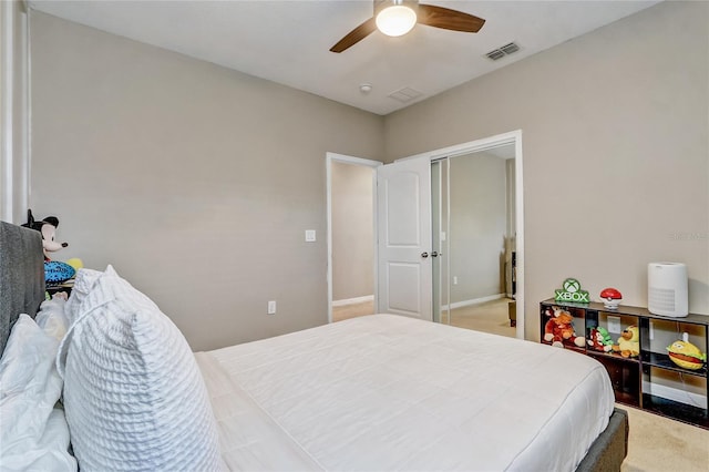 17084 Harbor Oak Pkwy, Winter Garden, FL 34787 - bedroom with a ceiling fan and carpet
