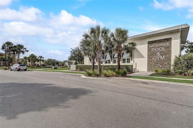 17084 Harbor Oak Pkwy, Winter Garden, FL 34787 - view of asphalt road with sidewalks and curbs