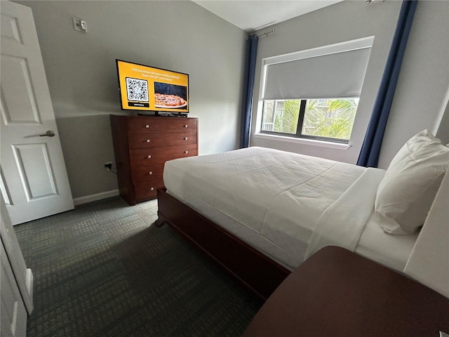 14501 Grove Resort Unit 1409, Winter Garden, FL 34787 - carpeted bedroom with baseboards