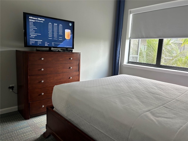 14501 Grove Resort Unit 1409, Winter Garden, FL 34787 - bedroom featuring baseboards