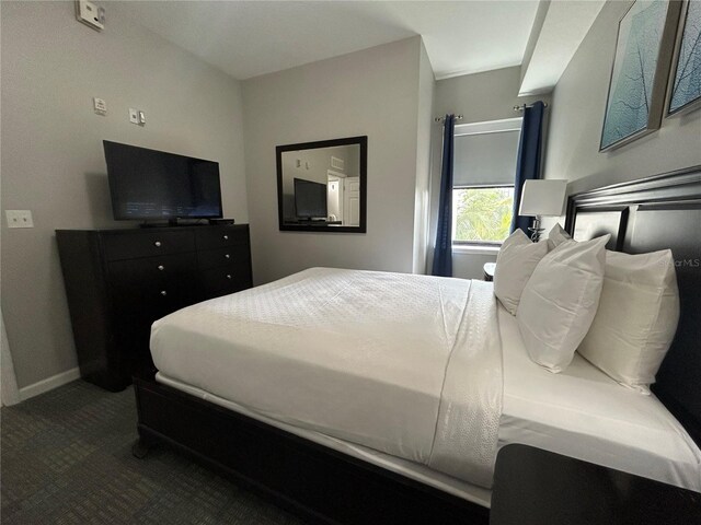 14501 Grove Resort Unit 1409, Winter Garden, FL 34787 - carpeted bedroom with baseboards