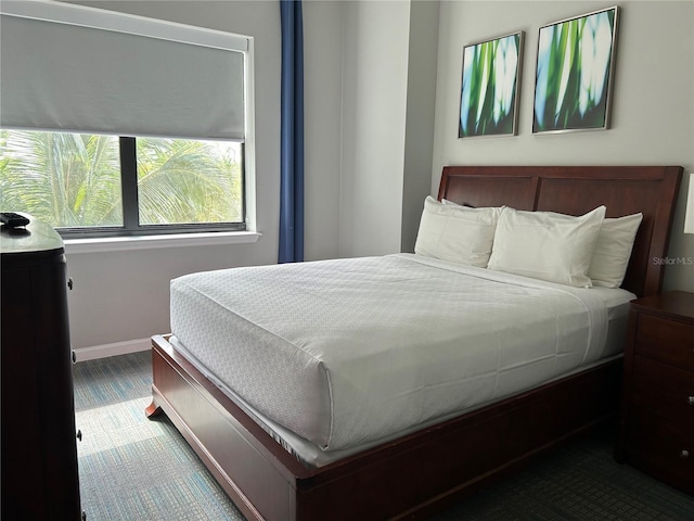 14501 Grove Resort Unit 1409, Winter Garden, FL 34787 - carpeted bedroom with baseboards