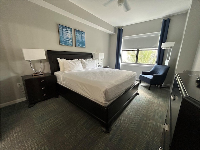 14501 Grove Resort Unit 1409, Winter Garden, FL 34787 - bedroom featuring dark carpet and baseboards