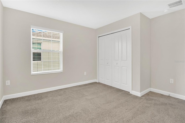 15060 Book Club Rd, Winter Garden, FL 34787 - unfurnished bedroom with carpet floors and a closet