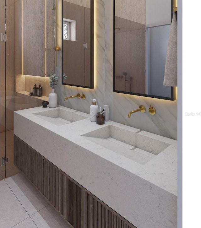 12818 Brunello Cir, Clermont, FL 34711 - bathroom featuring double vanity and tile patterned floors