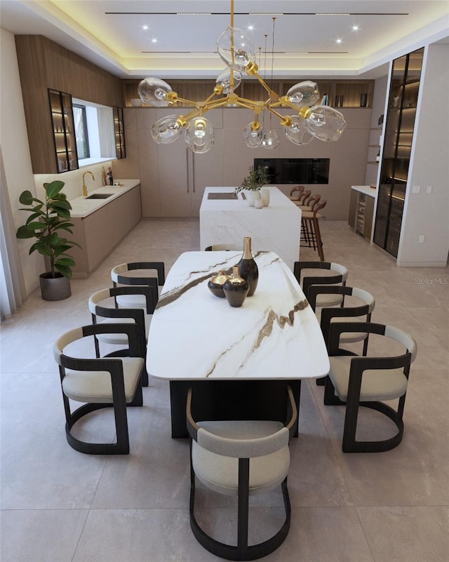 12818 Brunello Cir, Clermont, FL 34711 - dining room with a raised ceiling and a chandelier