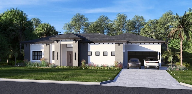 12818 Brunello Cir, Clermont, FL 34711 - view of front of property featuring a front lawn, an attached garage, decorative driveway, and stucco siding