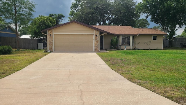 ranch-style home with a garage and concrete driveway