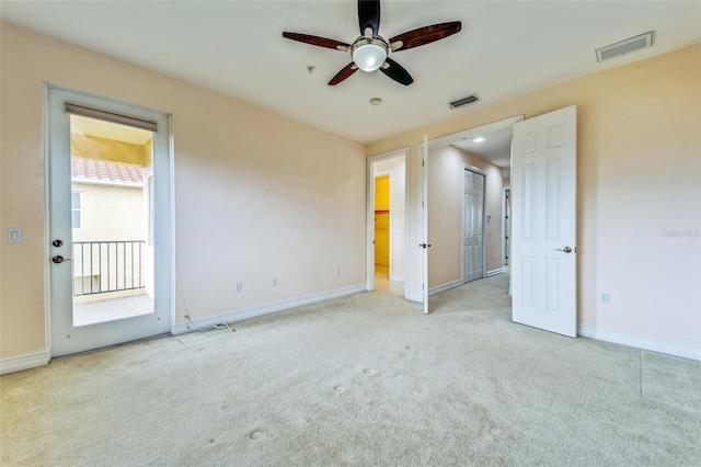 unfurnished bedroom featuring carpet and baseboards