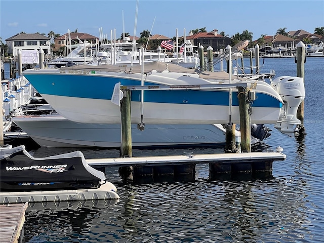 dock featuring a water view and boat lift