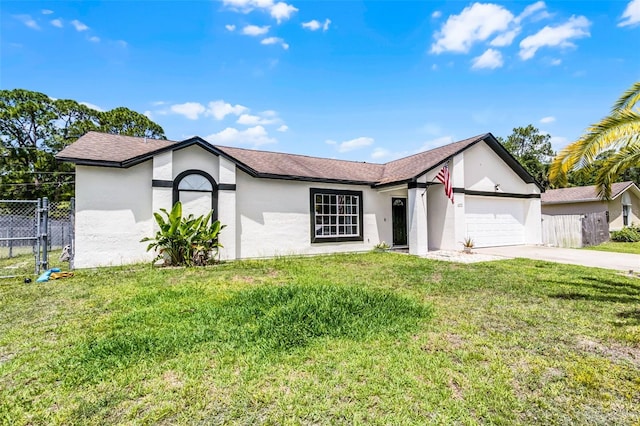 ranch-style home featuring concrete driveway, a garage, and stucco siding