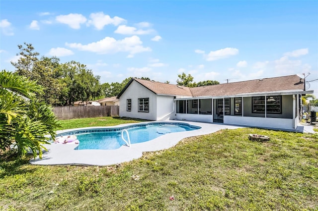 view of pool featuring a sunroom