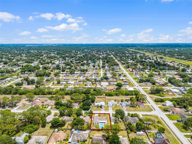aerial perspective of suburban area with property parcel outlined