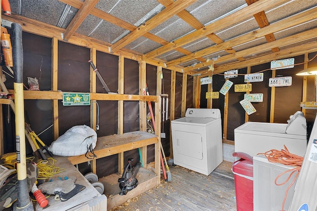 storage room featuring independent washer and dryer