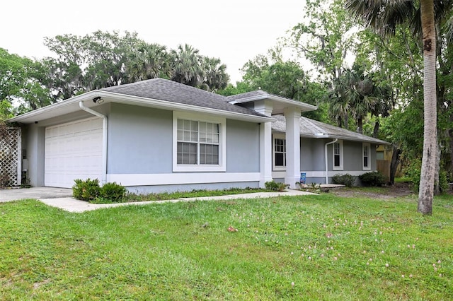1430 Arrowhead Trl, Deltona, FL 32725 - view of front facade featuring stucco siding, an attached garage, a front yard, and asphalt driveway