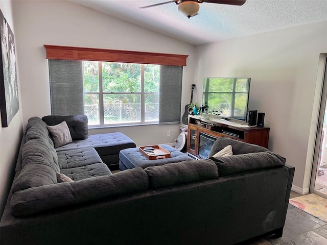 1430 Arrowhead Trl, Deltona, FL 32725 - living area with ceiling fan, vaulted ceiling, and a textured ceiling