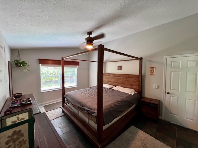 1430 Arrowhead Trl, Deltona, FL 32725 - bedroom with ceiling fan, a textured ceiling, and baseboards