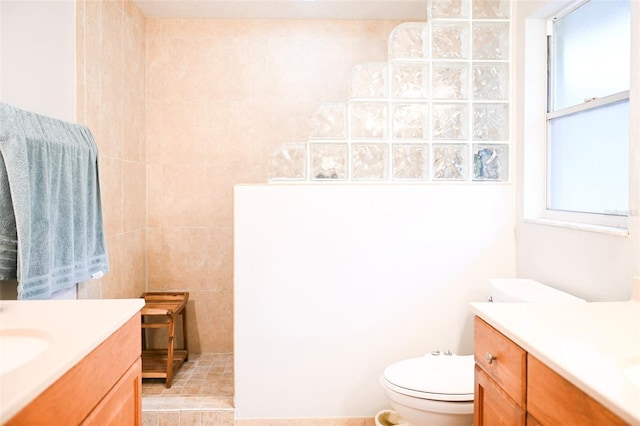 1430 Arrowhead Trl, Deltona, FL 32725 - bathroom with vanity, walk in shower, and toilet