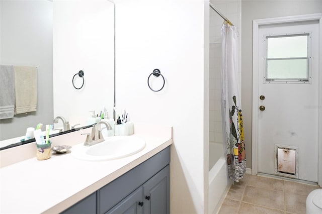 1430 Arrowhead Trl, Deltona, FL 32725 - full bath featuring vanity, tile patterned floors, and shower / tub combo with curtain