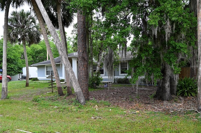 1430 Arrowhead Trl, Deltona, FL 32725 - obstructed view of property featuring stucco siding