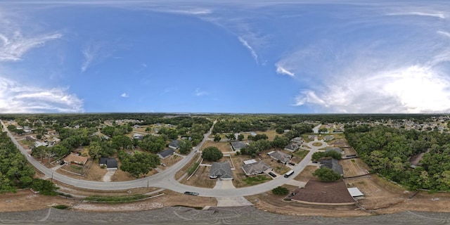 aerial view of property's location with nearby suburban area