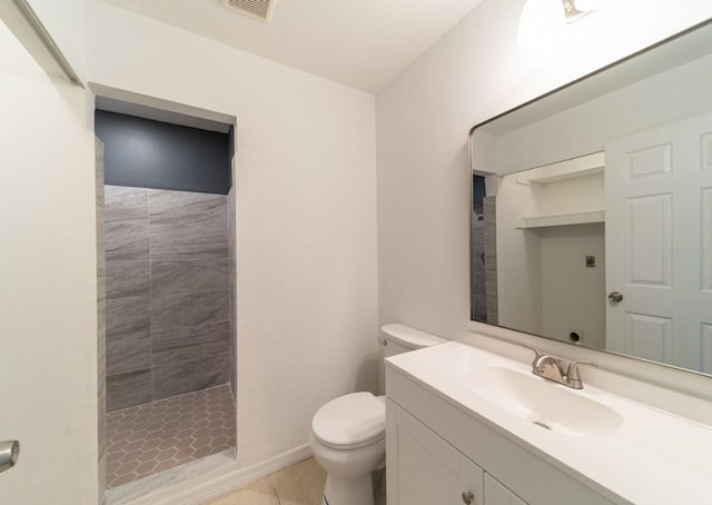 6345 Hatcher Rd, Lakeland, FL 33811 - full bathroom featuring toilet, a stall shower, vanity, and tile patterned floors