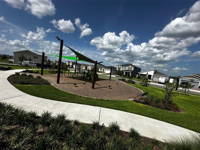 1141 Lakeshore Breeze Pl, Kissimmee, FL 34747 - community jungle gym with a residential view and a lawn