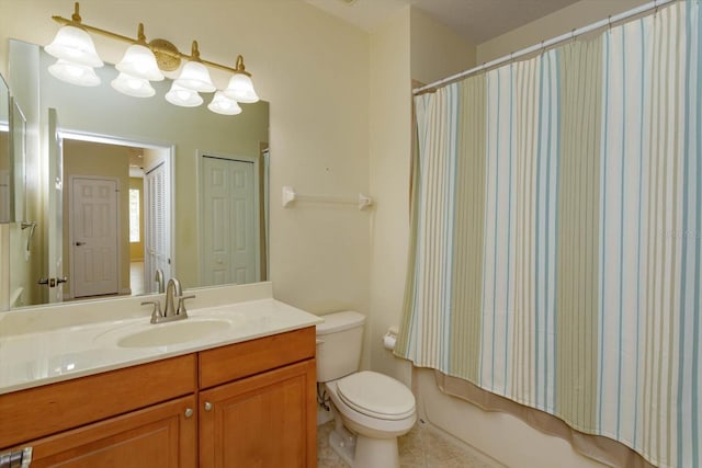bathroom featuring toilet, vanity, shower / bath combination with curtain, and tile patterned floors