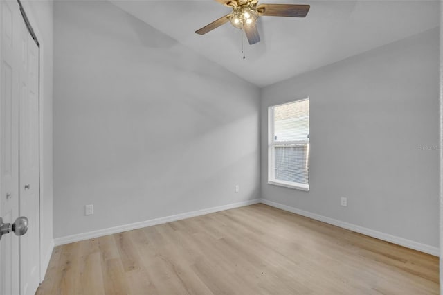 2643 Alamosa Pl, Lake Mary, FL 32746 - empty room featuring lofted ceiling, light wood-style flooring, baseboards, and ceiling fan