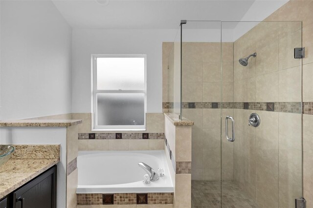 2643 Alamosa Pl, Lake Mary, FL 32746 - bathroom featuring a stall shower, a bath, and vanity