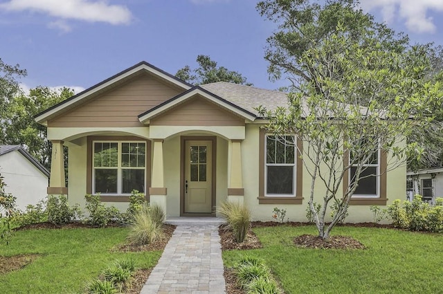 1371 Lake Dr, Casselberry, FL 32707 - view of front of home featuring a front lawn and stucco siding