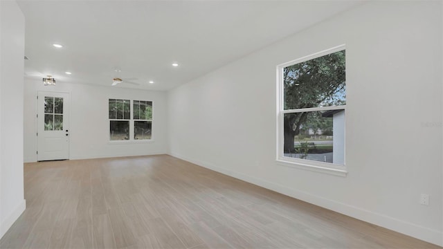 1371 Lake Dr, Casselberry, FL 32707 - spare room featuring baseboards, a ceiling fan, recessed lighting, and light wood-type flooring