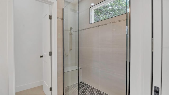 1371 Lake Dr, Casselberry, FL 32707 - full bathroom featuring a tile shower and baseboards