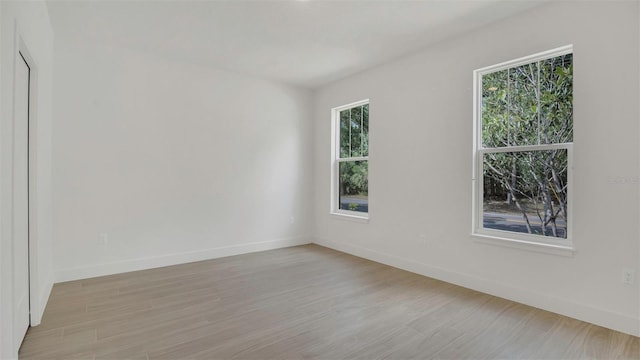 1371 Lake Dr, Casselberry, FL 32707 - empty room with baseboards and light wood finished floors